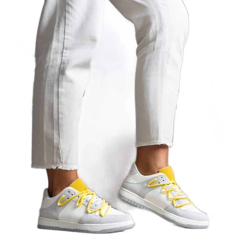 Gray sneakers with yellow laces from Aucoin grey