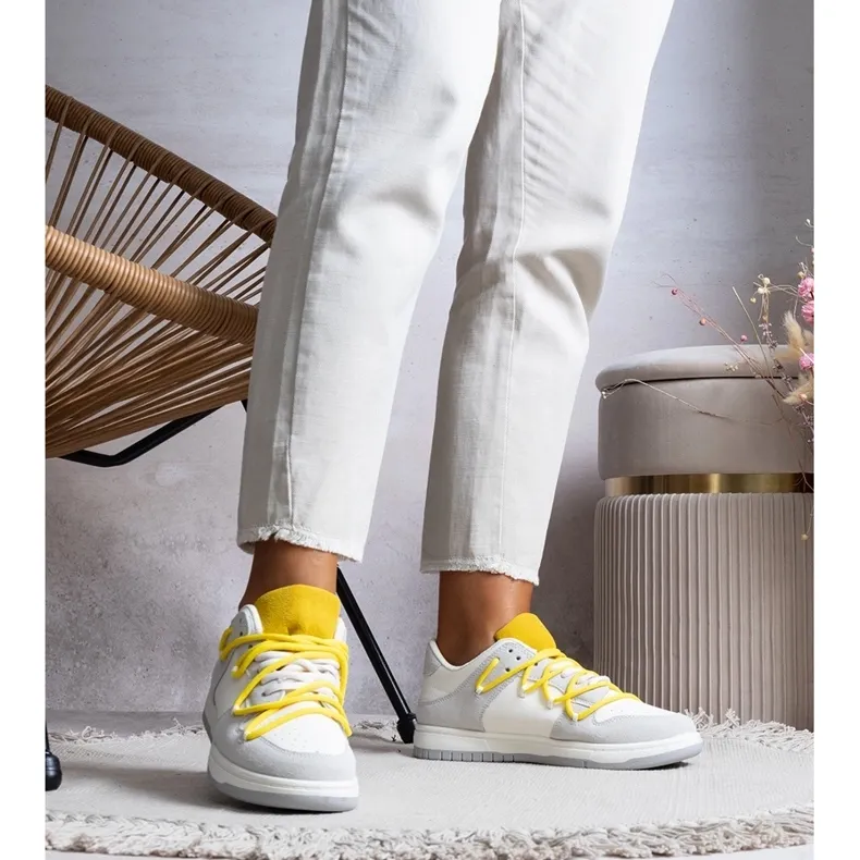 Gray sneakers with yellow laces from Aucoin grey