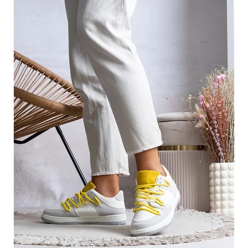 Gray sneakers with yellow laces from Aucoin grey