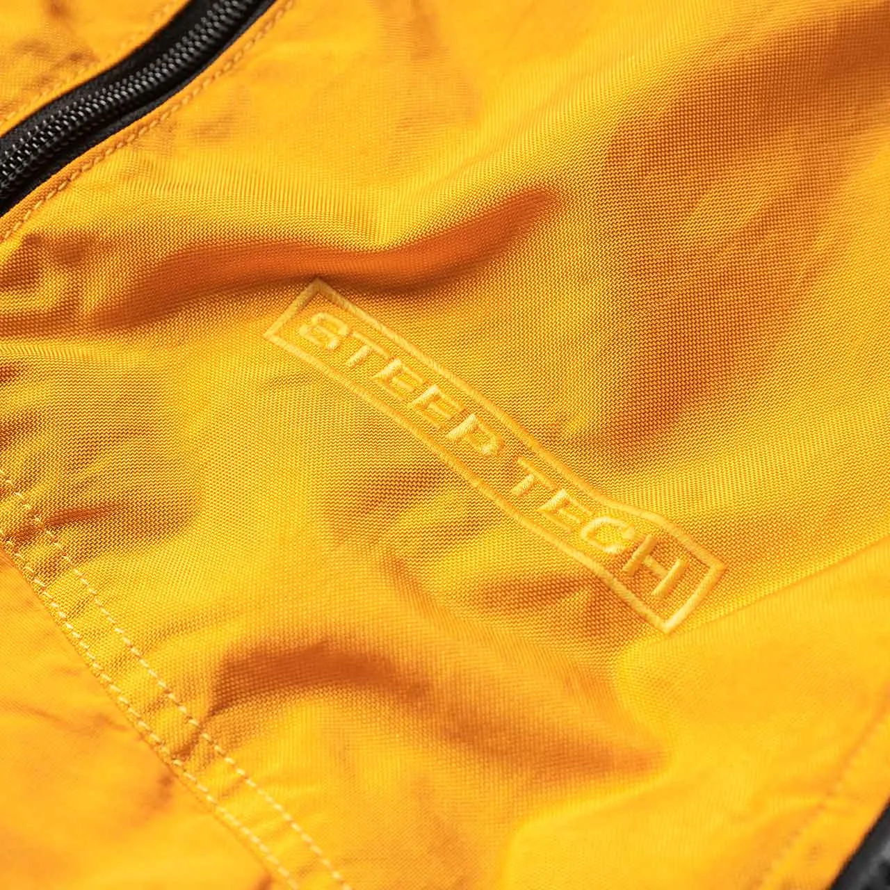 the north face black series steep tech jacket (summit gold)